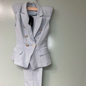 Fashion Nova  light blue pantsuit/shoulder pads